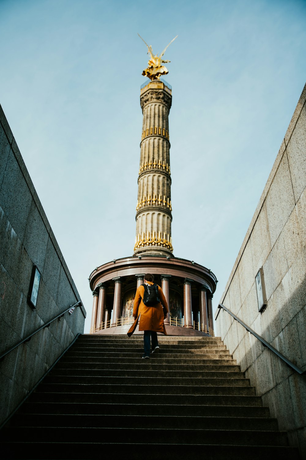 a person walking up a set of stairs