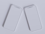 Two modern smartphones with sleek, minimalistic design are placed side by side against a light gray background. Their screens are off, reflecting the ambient light, and they feature a simple, elegant look with rounded edges and a clean interface.