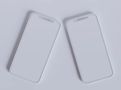 Two mobile phones side by side showing a sleek monochrome and navy website design.
