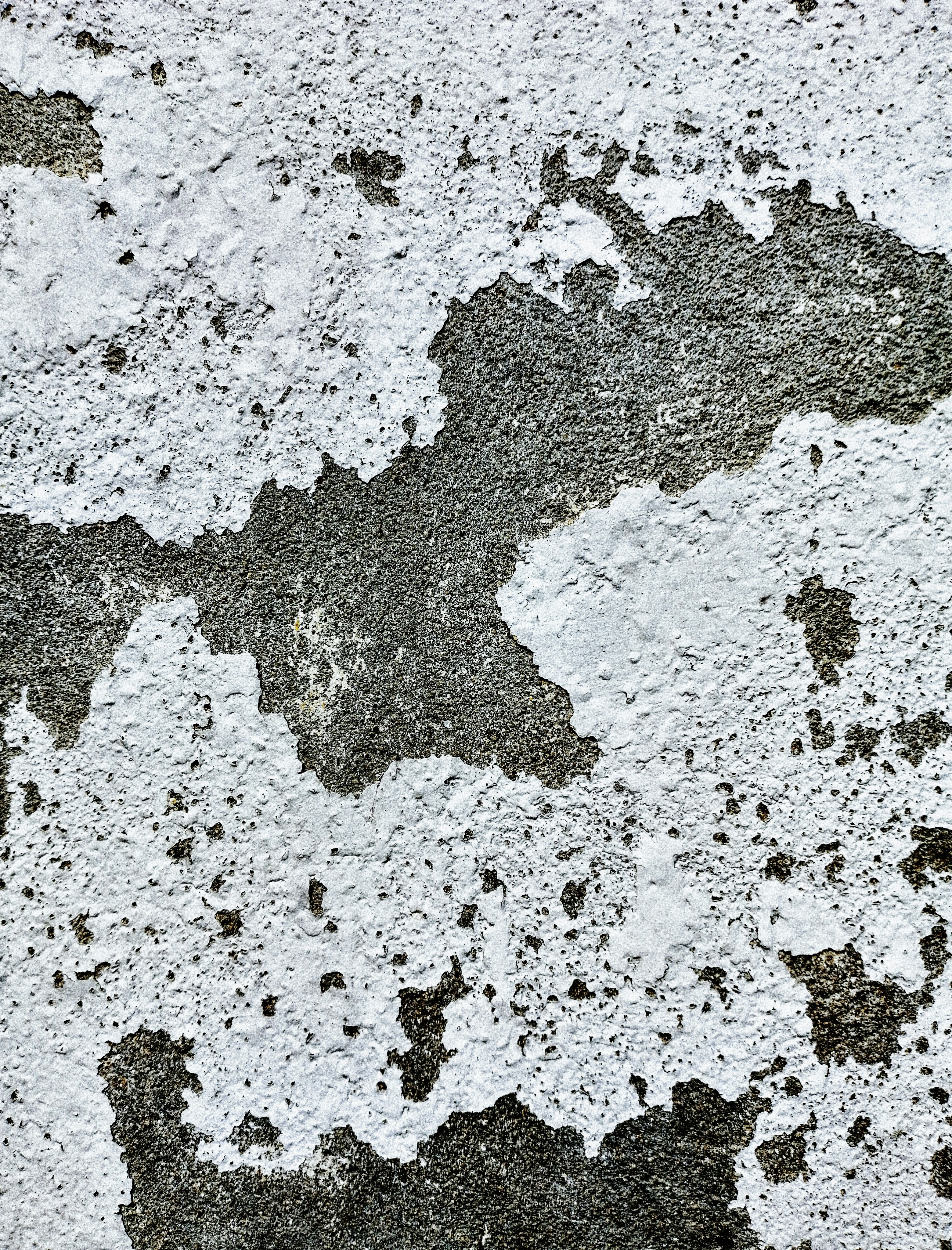 a close up of a white and black wall