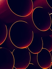 Close-up of a modern thermal sand storage system with visible heat-resistant pipes.