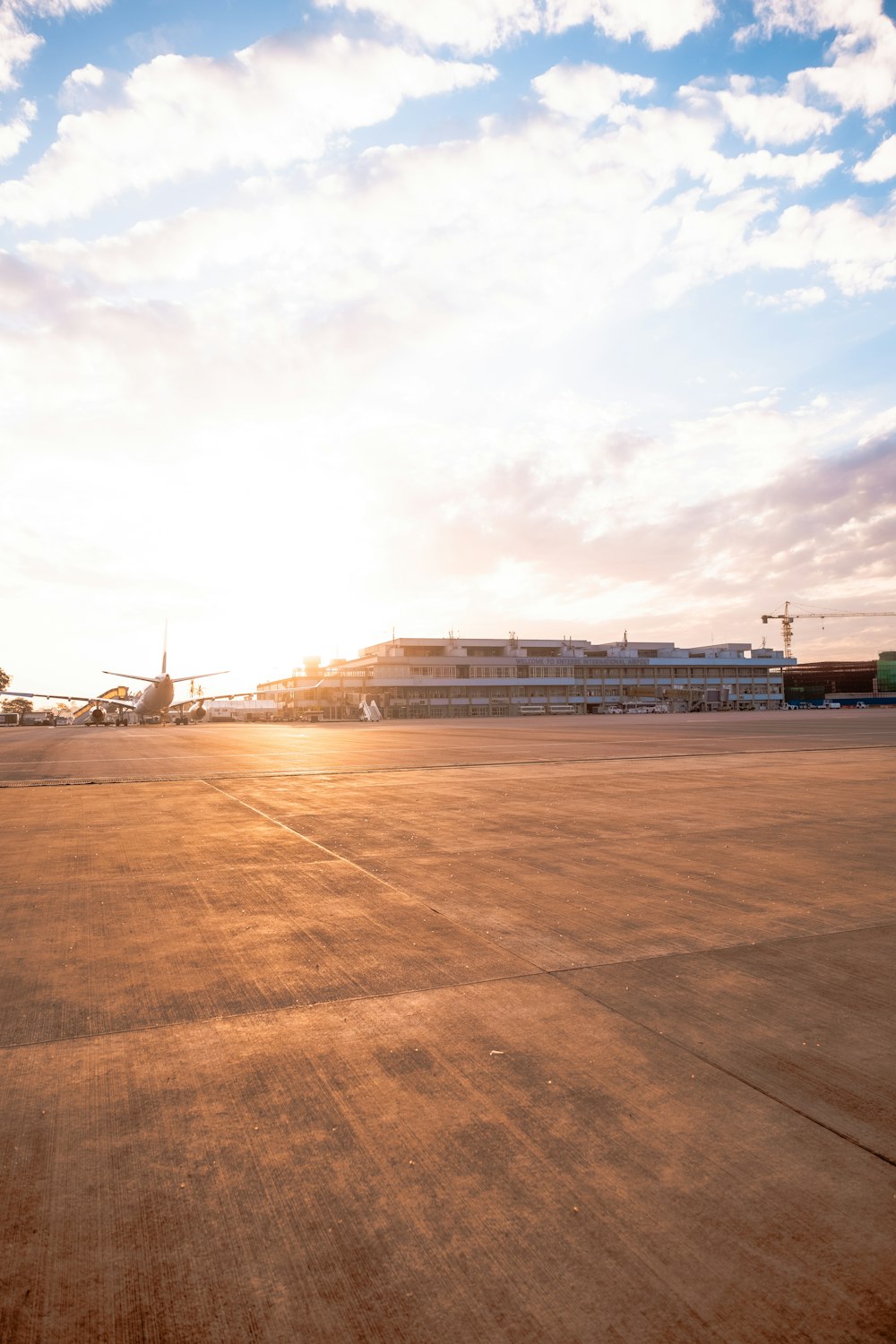 a person riding a skate board on a runway