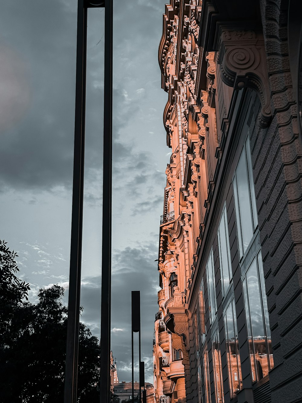 a tall building with a clock on the side of it