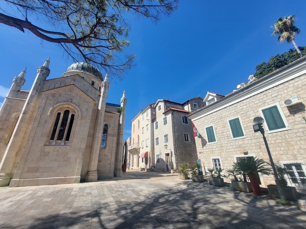 a stone building with a clock tower on top of it