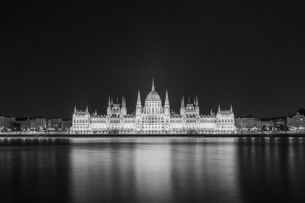 a black and white photo of a city at night