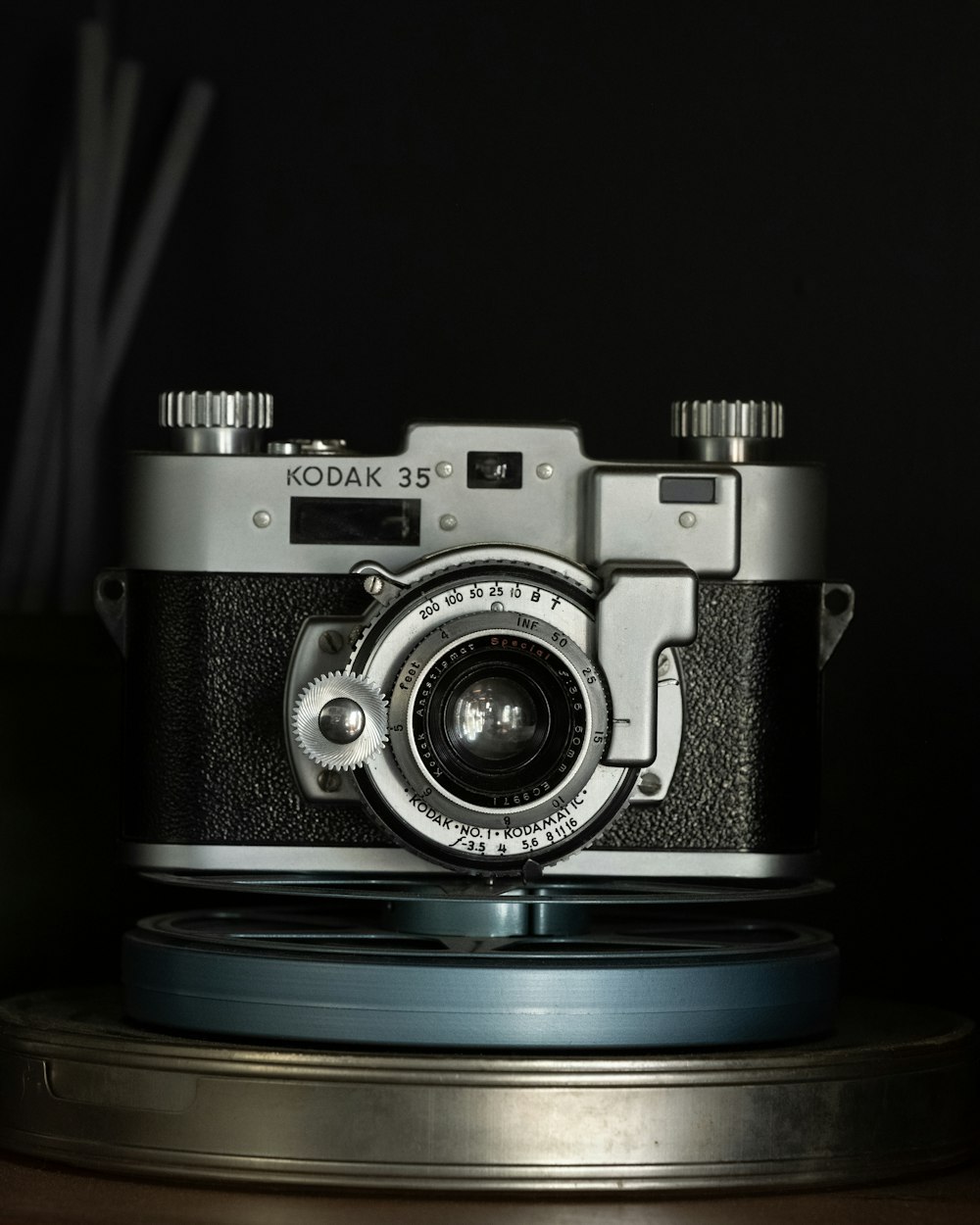 a camera sitting on top of a wooden table