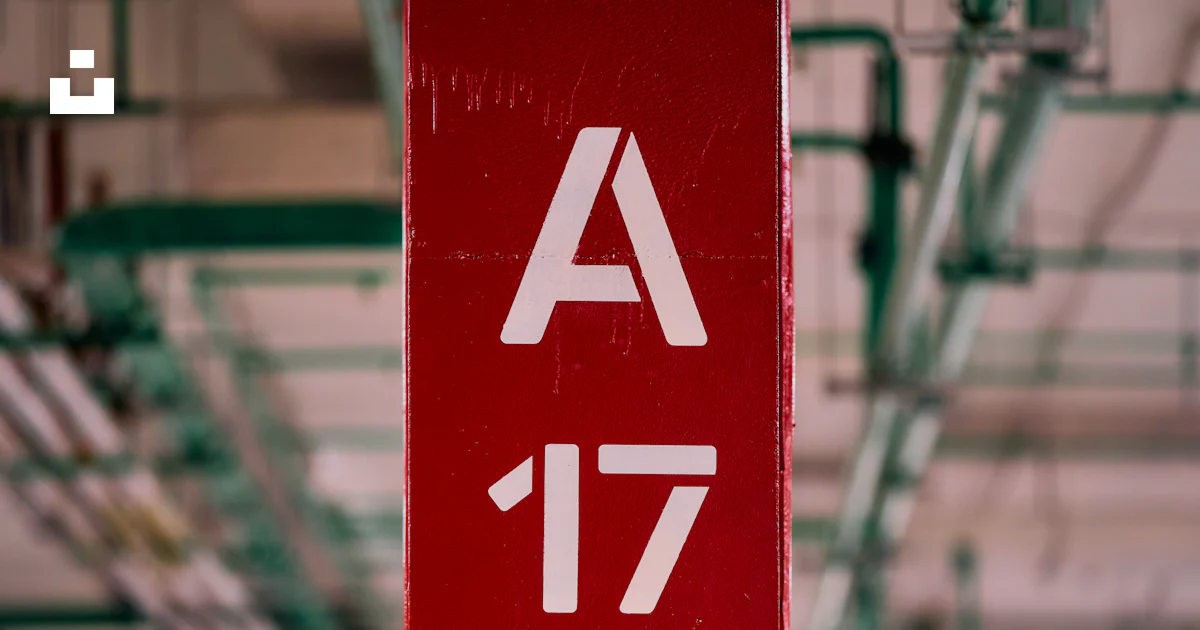 A Red Sign With The Number 17 On It Photo Free Red Image On Unsplash a-red-sign-with-the-number-17-on-it-photo-free-red-image-on-unsplash