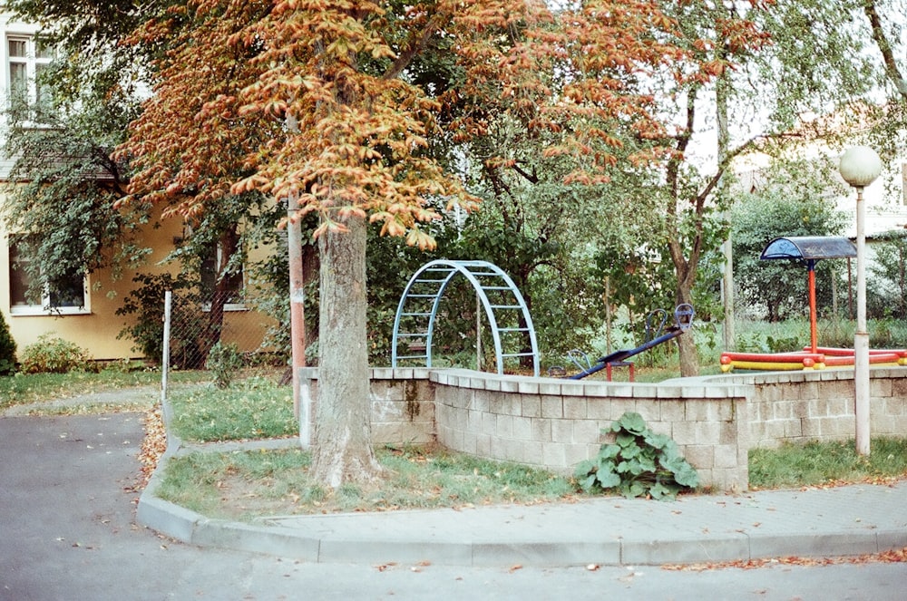 a park with a playground and a playground slide