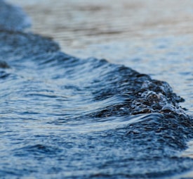 a close up of a wave in the water