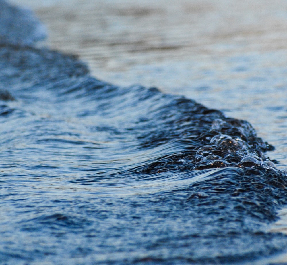 a close up of a wave in the water