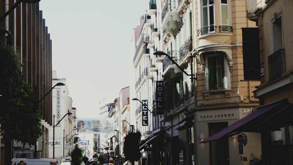 a city street filled with lots of tall buildings