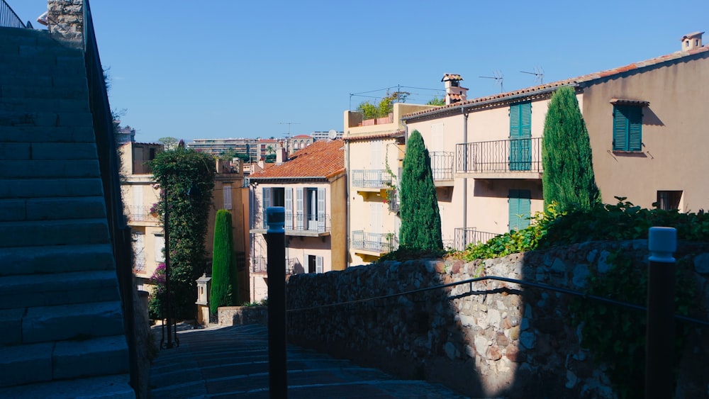 a view of a street with buildings and trees