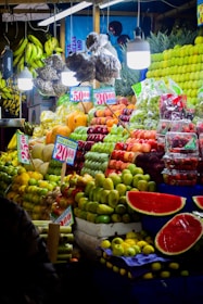 a fruit stand filled with lots of different types of fruit