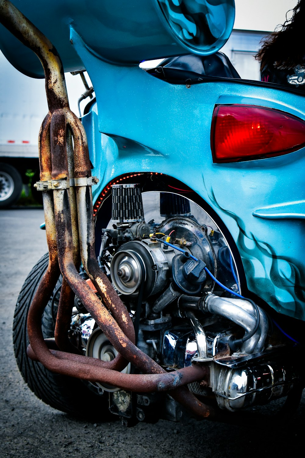 a close up of a motorcycle with a chain attached to it