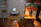 A peaceful indoor setting with warm lighting and calming crystals arranged for a psychic session.