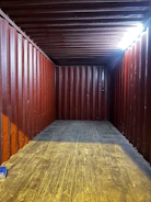 a room with a lot of storage containers in it