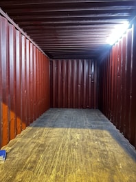 a room with a lot of storage containers in it