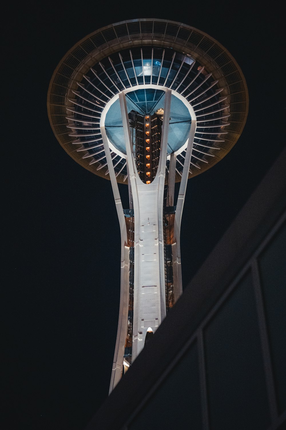 the space needle at night with the lights on
