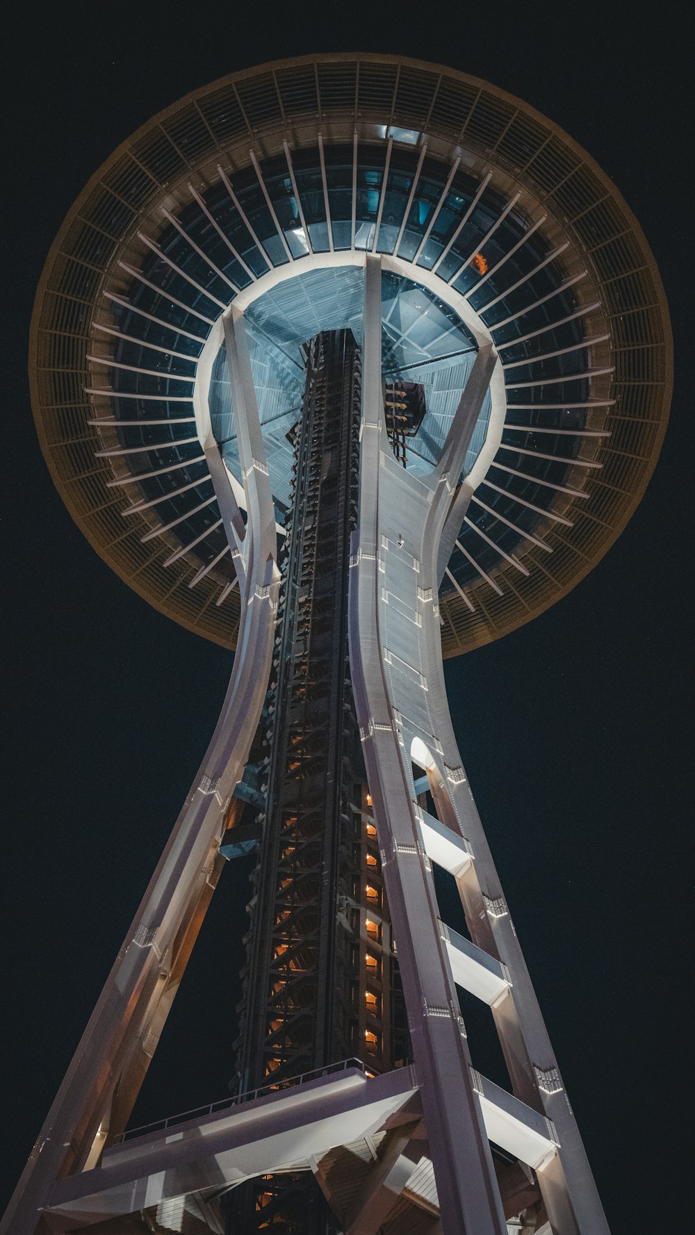 a tall tower with a sky scraper on top of it