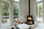 Interior view of a bright bungalow living room with natural wood finishes