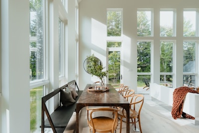 A bright dining area showcasing an elegant wooden table.