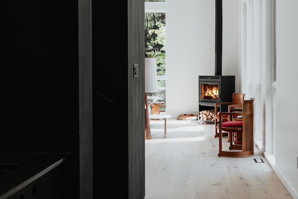 a room with a chair and a fire place