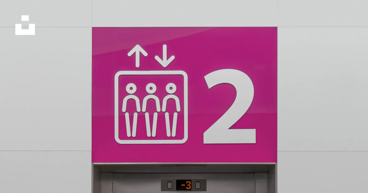 Two Indicators Sign A pink sign that says 2 on it photo – Free Pink Image on Unsplash