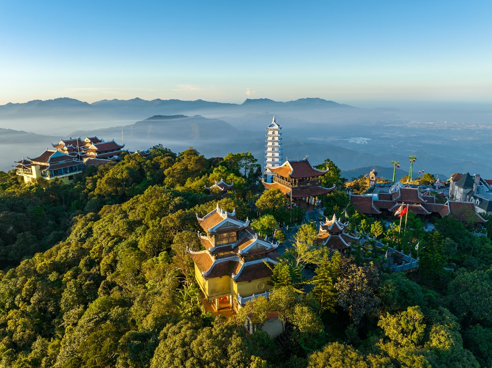 an aerial view of a village on a mountain