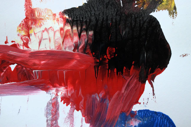 A bold contemporary painting featuring vibrant abstract strokes in black and white with red highlights