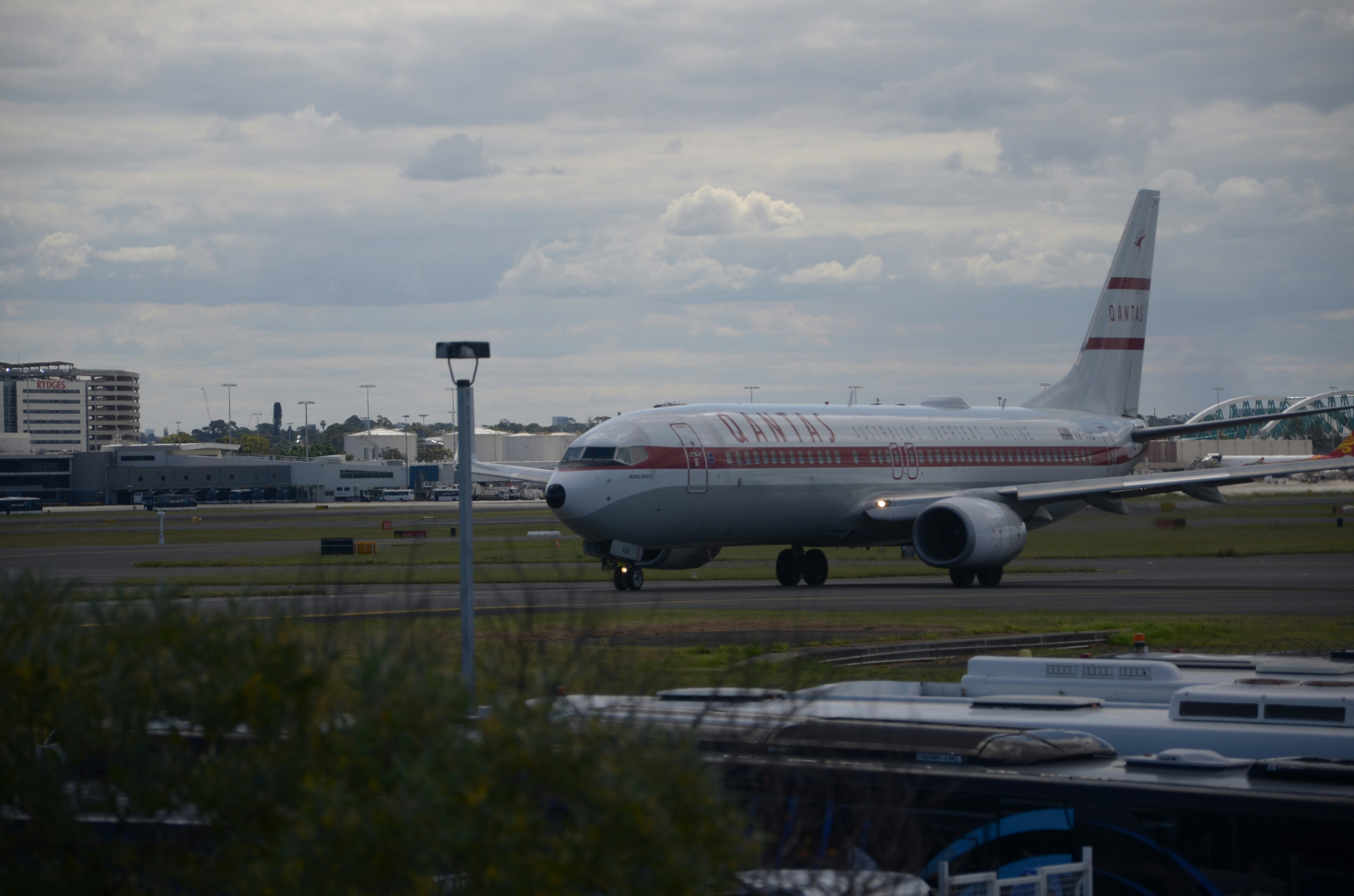 a large jetliner sitting on top of an airport runway