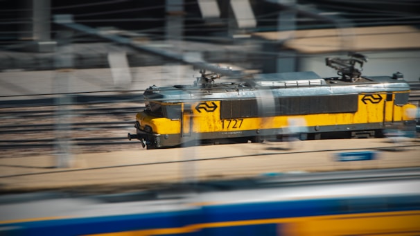 An animated graphic showing a progress bar moving quickly with a train icon.