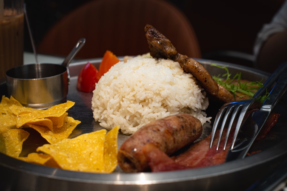 a plate of food with a fork and a knife