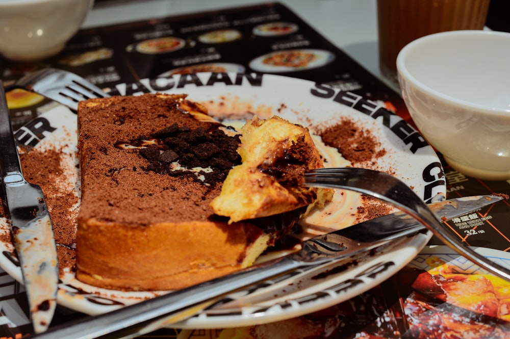 a piece of cake on a plate with a fork