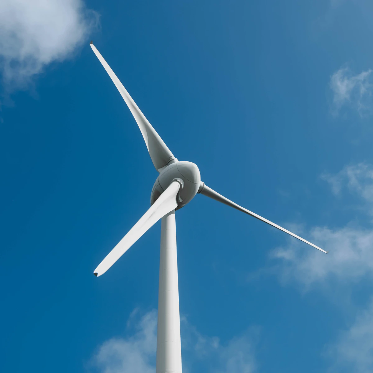 Wind turbine on a bright sky