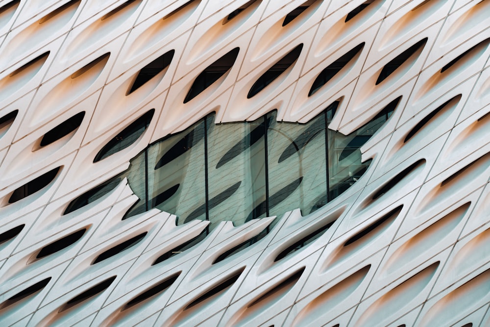 a close up of a building with a circular window