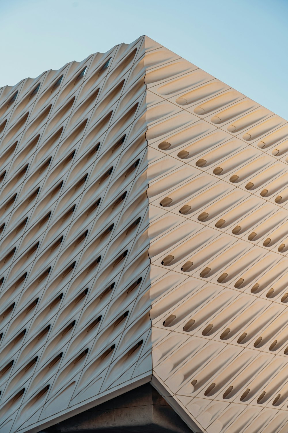 a close up of a building with a sky background