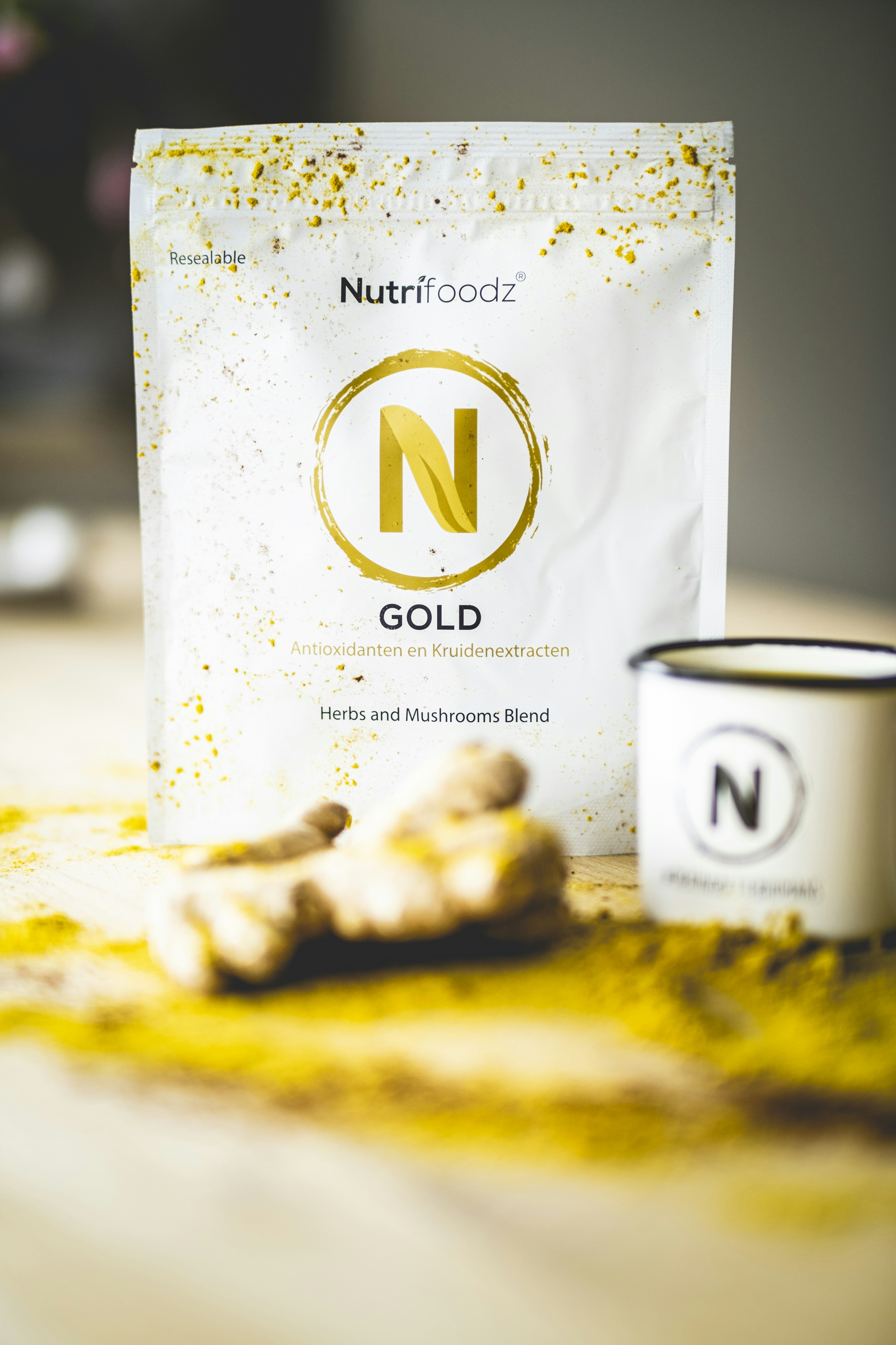 a bag of nutritious gold next to a cup of coffee