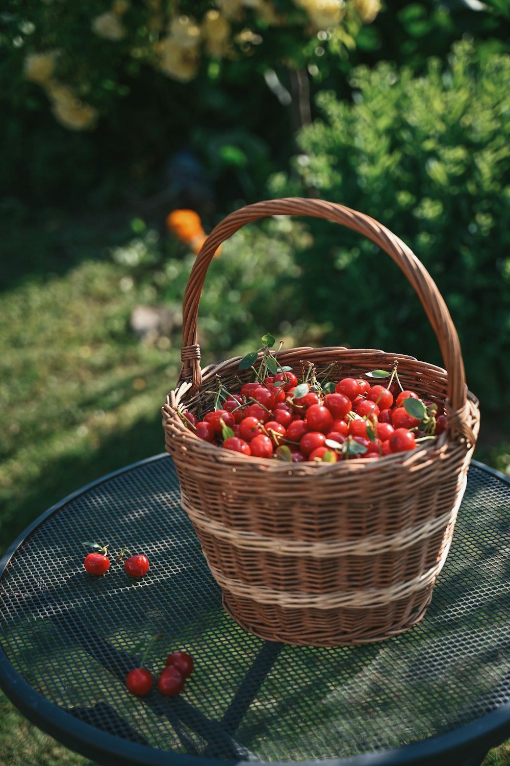 a basket full of strawberries sitting on a table