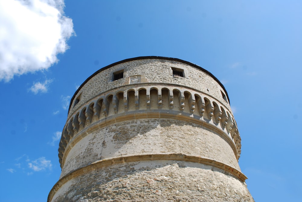 a very tall tower with a sky in the background