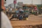 Tow truck assisting a motorcycle breakdown on a busy urban street in Itaquaquecetuba.