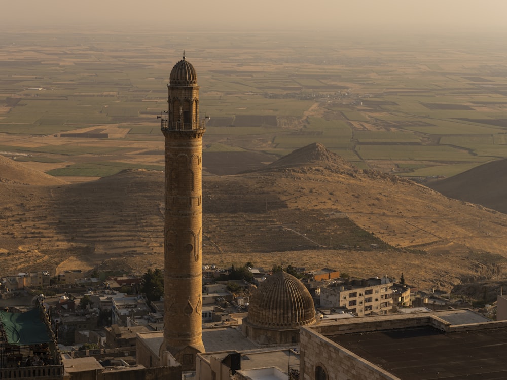 a tall tower sitting in the middle of a city