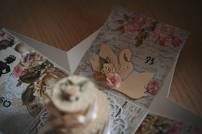 A heartfelt sympathy card with intricate paper cutouts of doves and gentle script lettering.