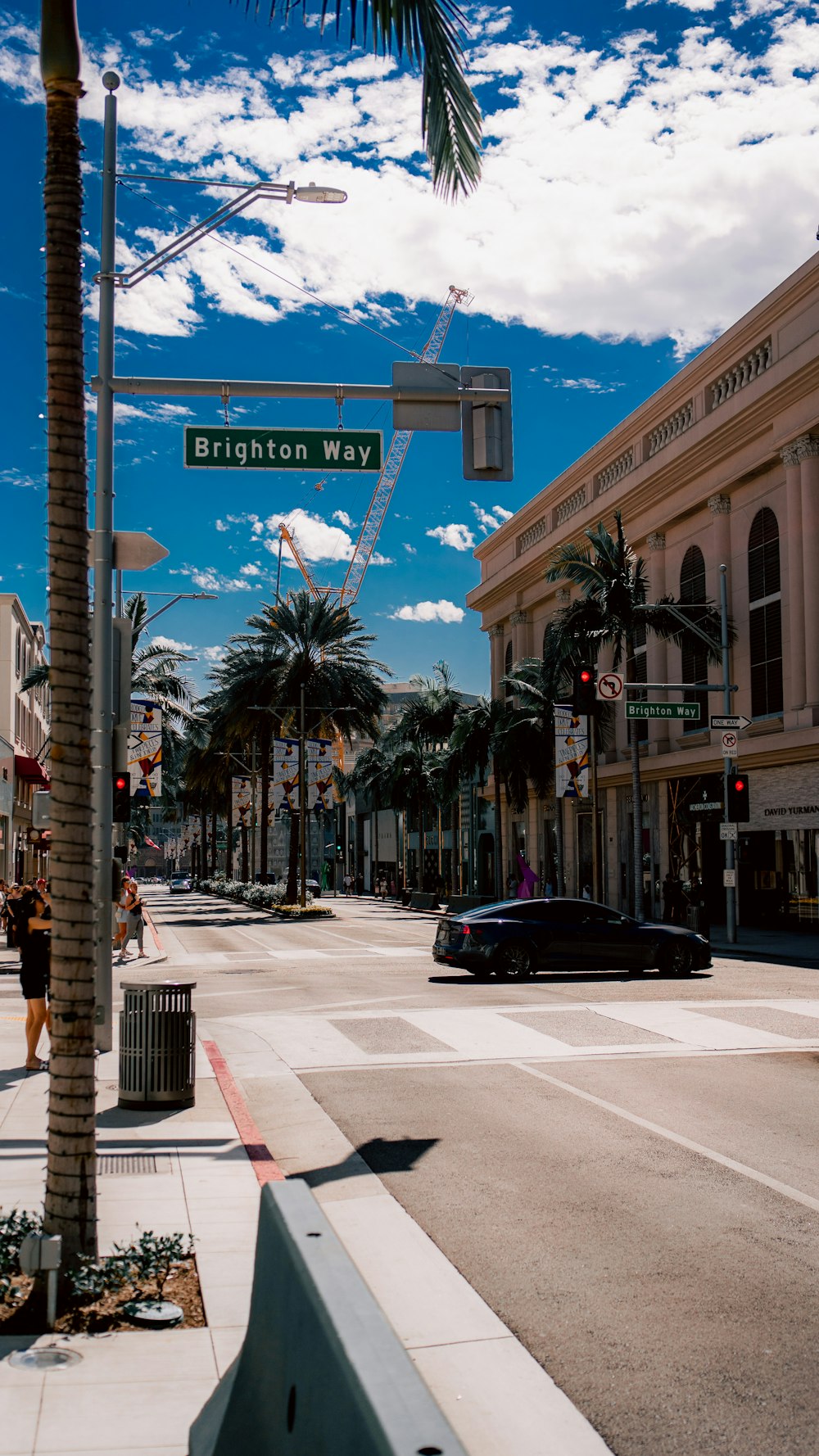 a street sign on the corner of a city street