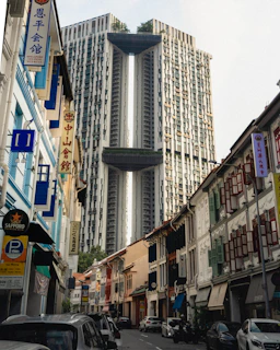 Exterior view of Tropicana 218 Macalister building with nearby city attractions