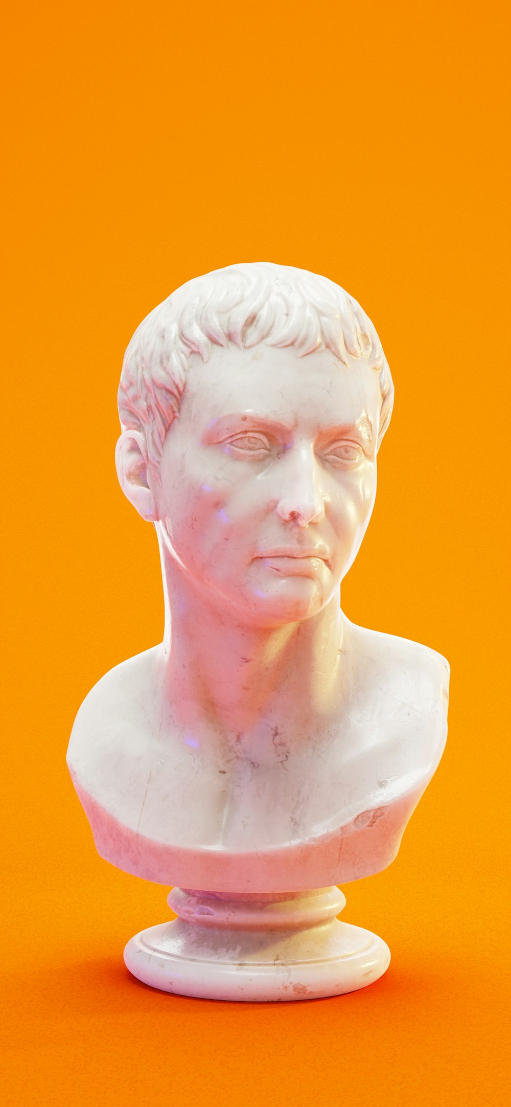 a marble bust of a man on an orange background