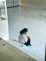 Picture of Nahyene Fortunato Flores reviewing contracts with focused attention.