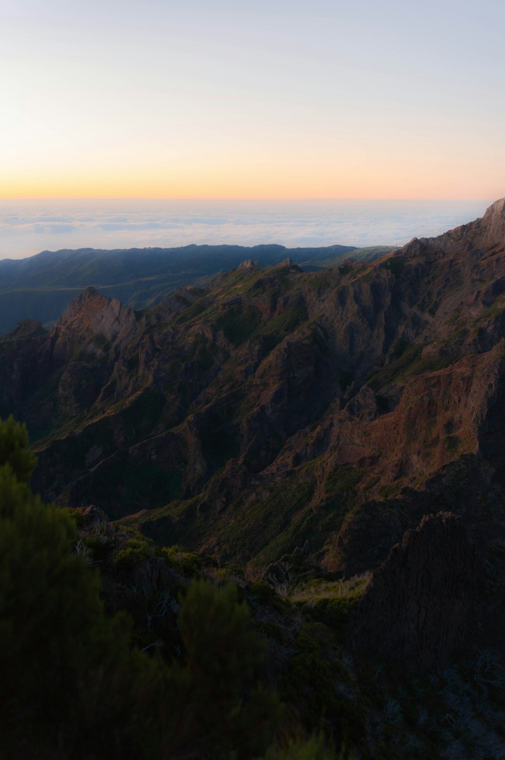 a view of a mountain range at sunset