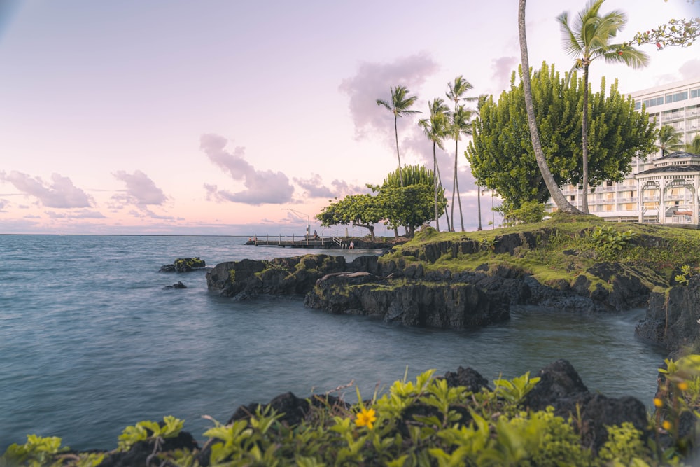 a view of the ocean from the shore of a resort