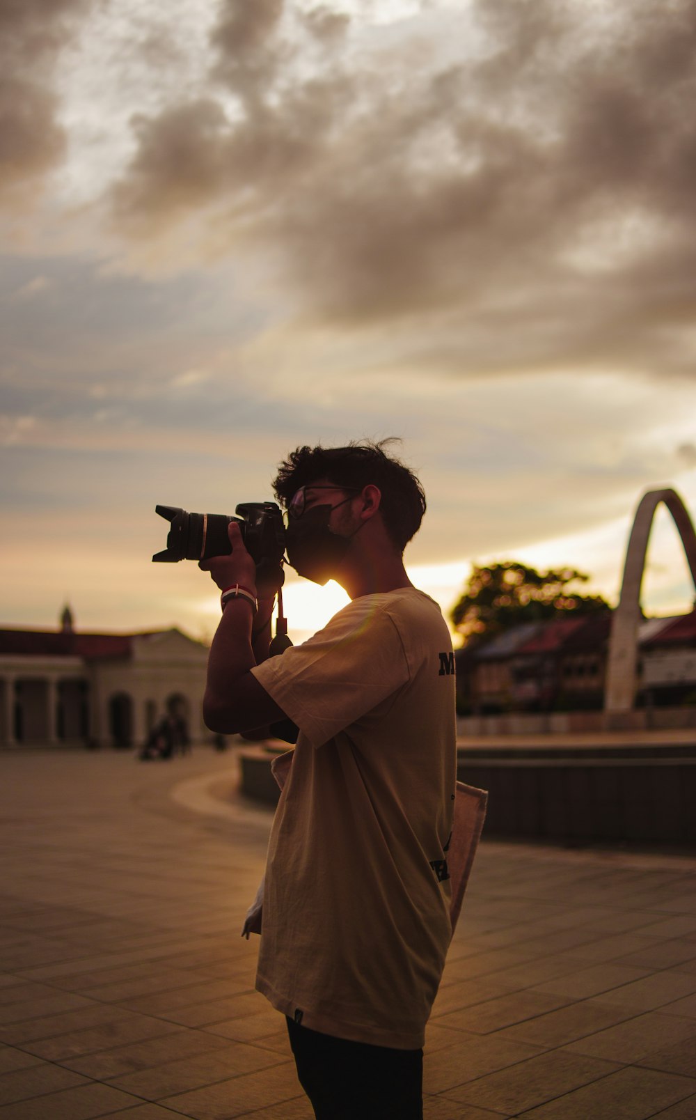 a man taking a picture with a camera