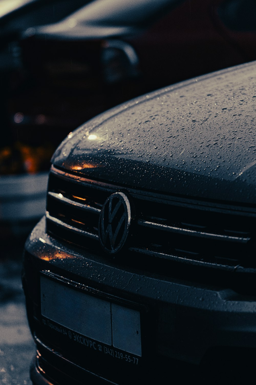 a close up of a car parked in a parking lot